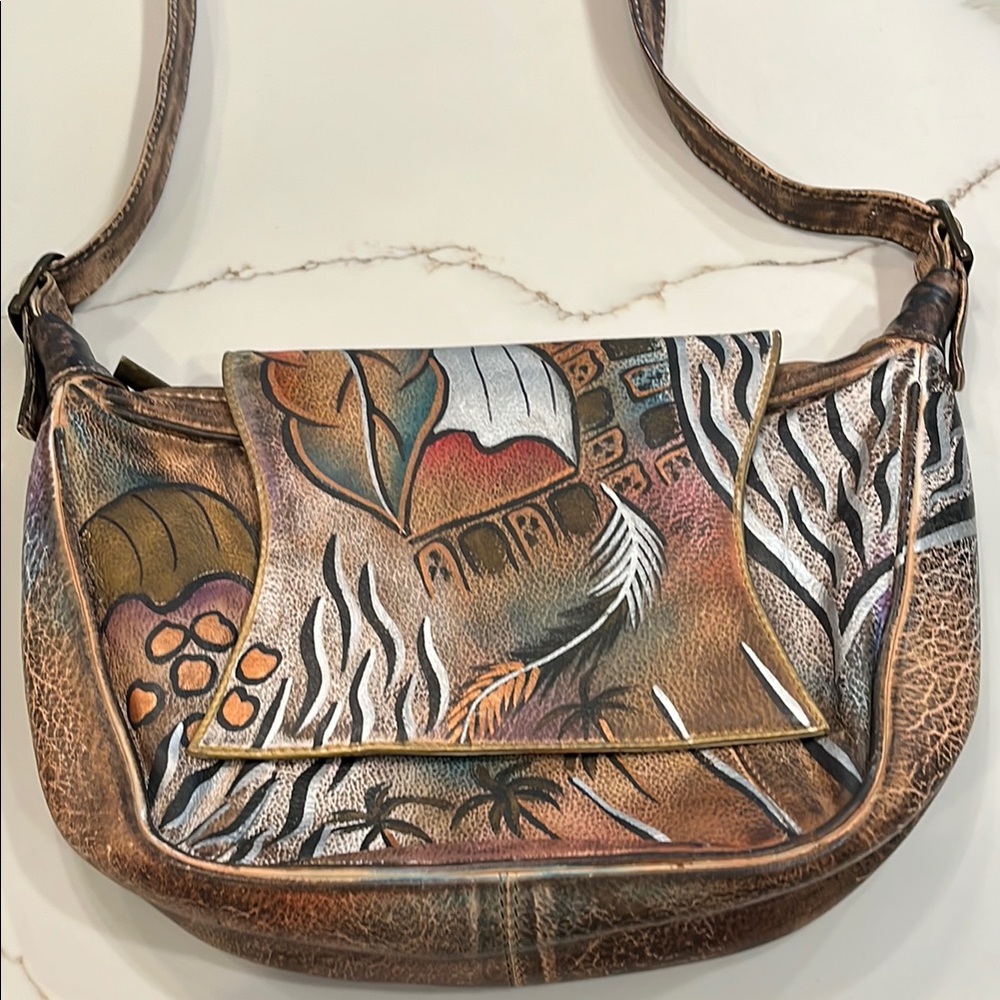 Hand Painted Leather Sova Crossbody.Never used. Earth tone & Silver/Gold accents